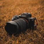 a camera sitting in the middle of a field