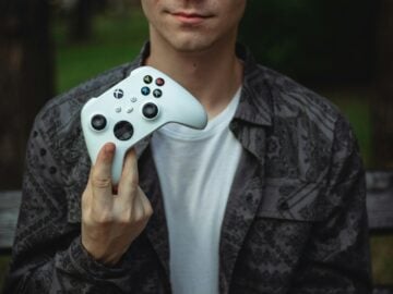 a person holding a video game controller