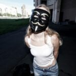 A woman with a mask on her face