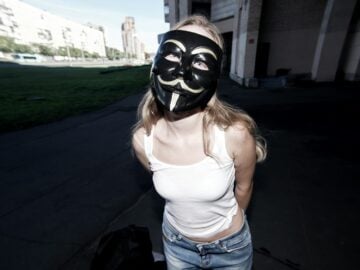 A woman with a mask on her face