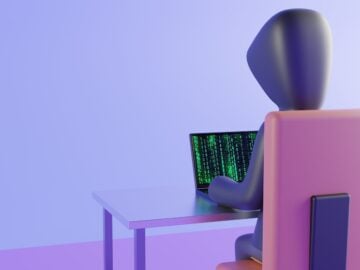 a few chairs with a table and a computer