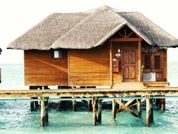 Why Your Vacation Rental Business Needs a Direct Booking Site 21 a wooden dock in front of a house