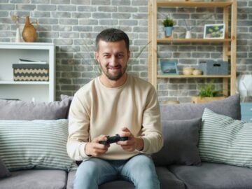 Discover What Makes Sohohindipro net Stand Out Online 15 Man playing video games on a couch