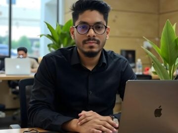 A man is working on his laptop.