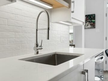 a kitchen with a sink and a window