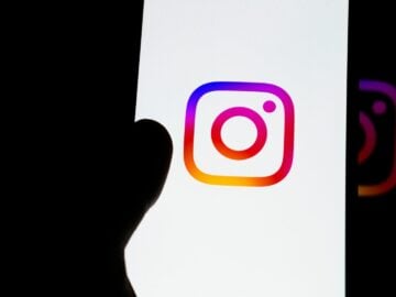 Instagram logo displayed on a smartphone screen.