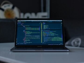 turned-on grey laptop computer