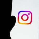 Instagram logo displayed on a smartphone screen